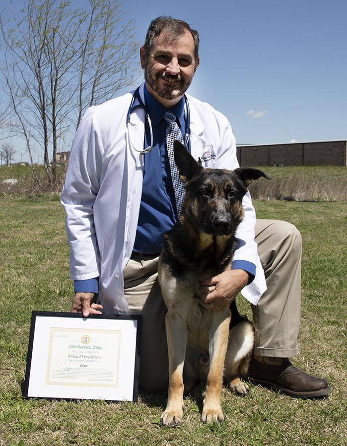 Richard Templeman and Zeus the service dog with certificate